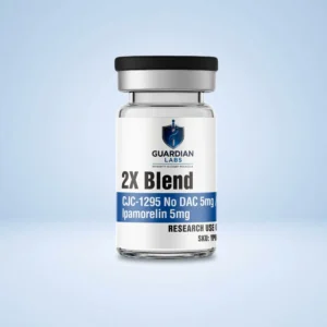 Close-up of a glass bottle with a black cap, Guardian Labs label visible with a blue shield logo and bold '2X Blend' text.