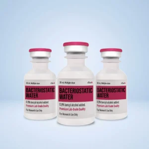 Bacteriostatic Water 30mL | Guardian Labs Three white 30 mL bacteriostatic water vials with pink caps standing against a light blue background.